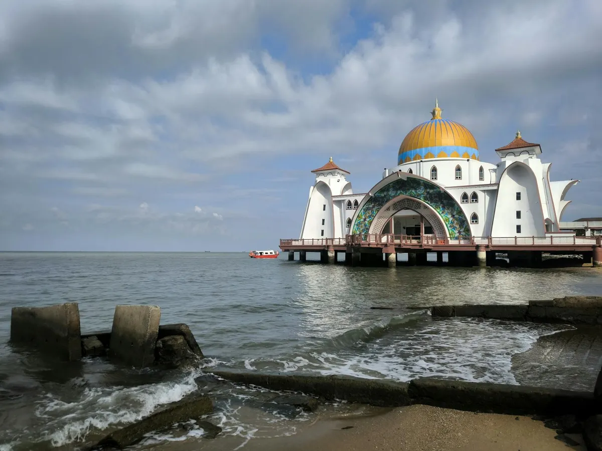 Beautiful view of the Malacca Straits Mosque against a cloudy sky, Malaysia