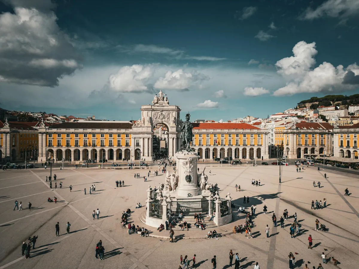 Stunning aerial view of Praça do Comércio in Lisbon, Portugal showcasing its architecture and vibrant atmosphere.