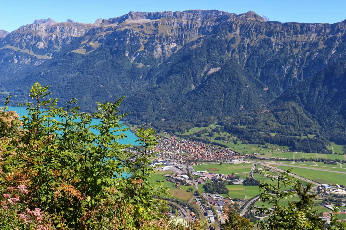 A stunning aerial view of Interlaken, nestled between mountains and lakes, viewed from Harder Kulm.